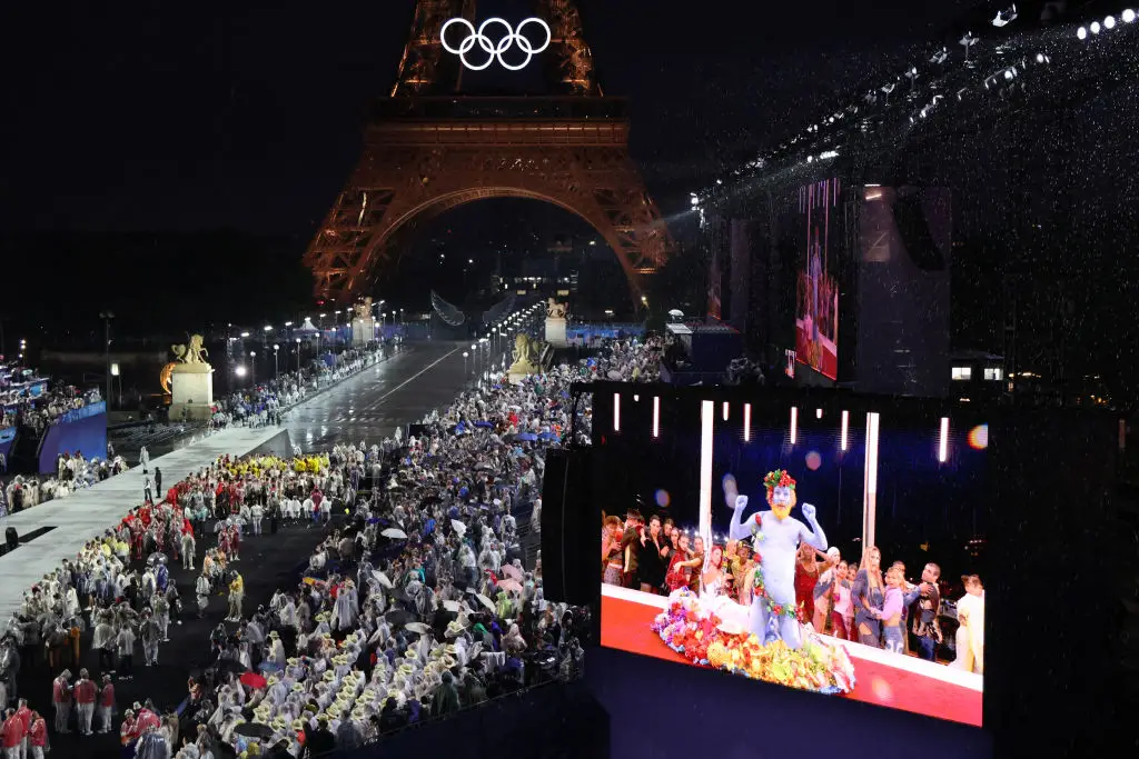 This is the first ever Olympics opening ceremony to not be held in a stadium. (LUDOVIC MARIN/POOL/AFP via Getty Images)