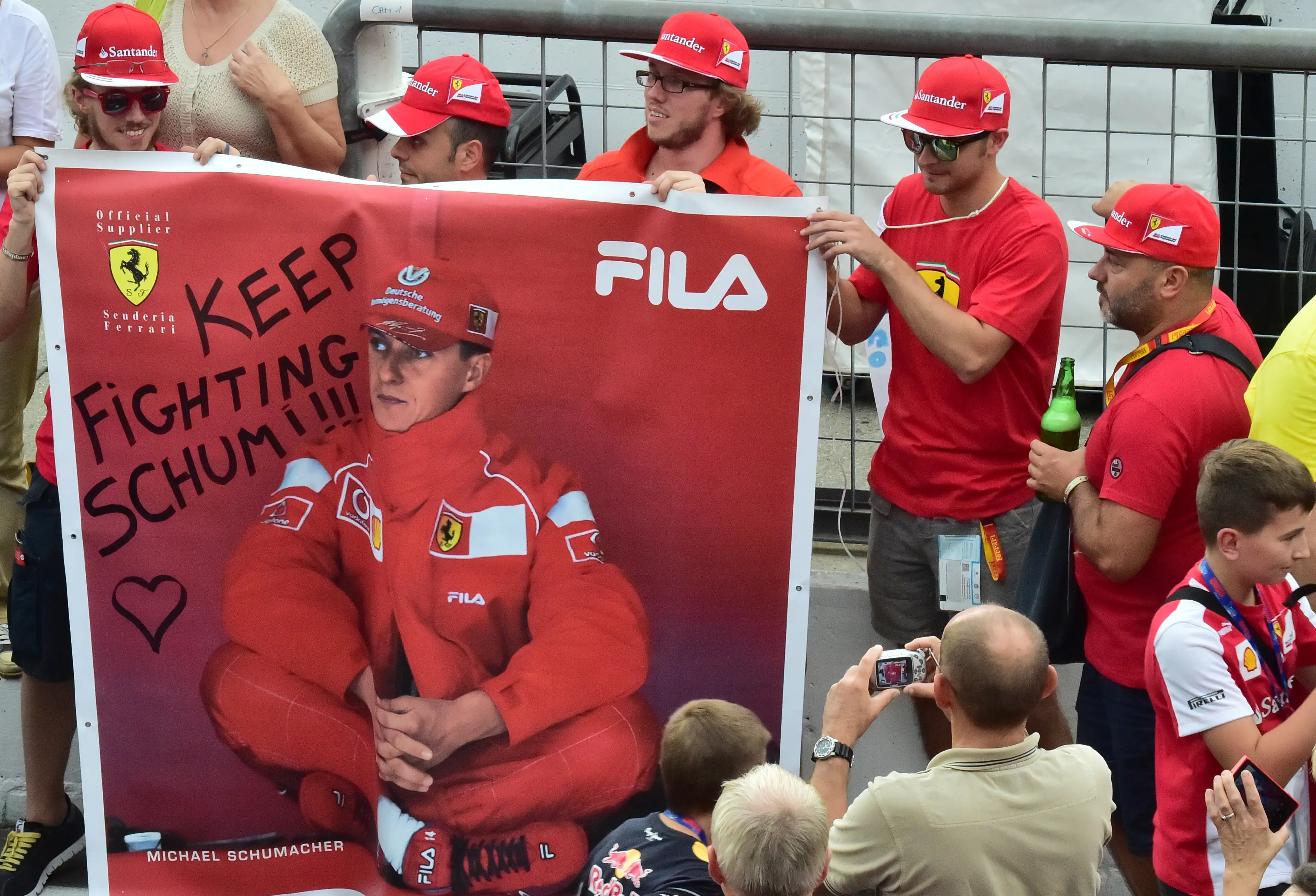 Ferrari fans wishing Schumacher the best following the incident (GIUSEPPE CACACE/AFP via Getty Images)