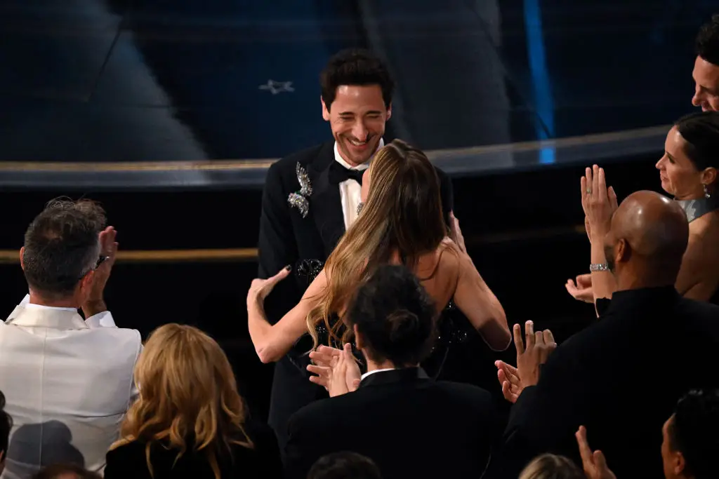 Brody and Chapman moments before the gum toss (PATRICK T. FALLON/AFP via Getty Images)