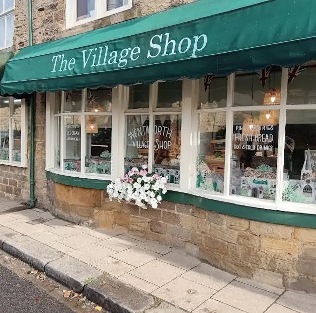 Homes and businesses have have to be uniform in colour, according to the rules (Facebook/Wentworth Village Shop)