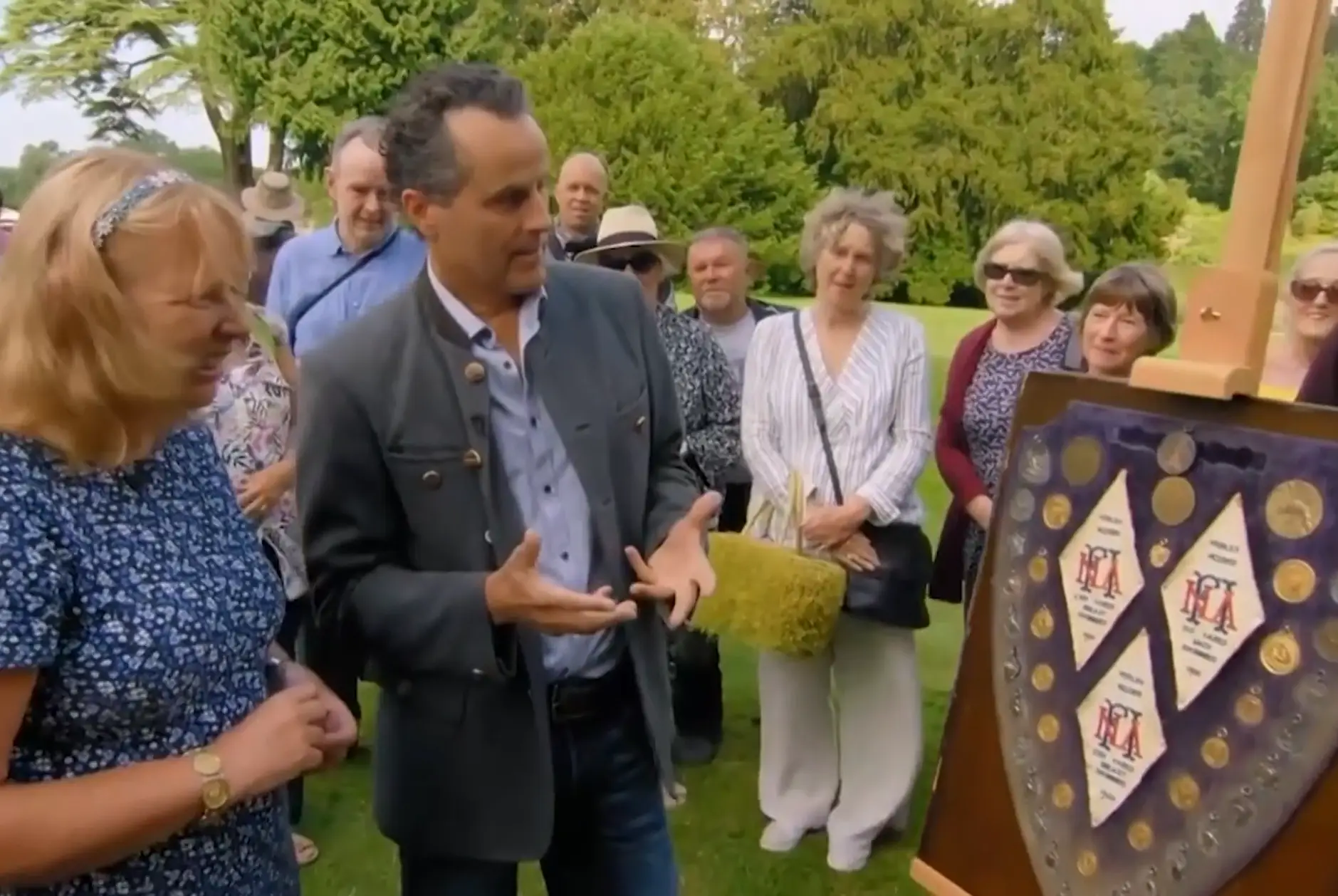 Julia brought on her grandmother's medal collection, including a gold medal from the Paris 1924 Olympics. (BBC)