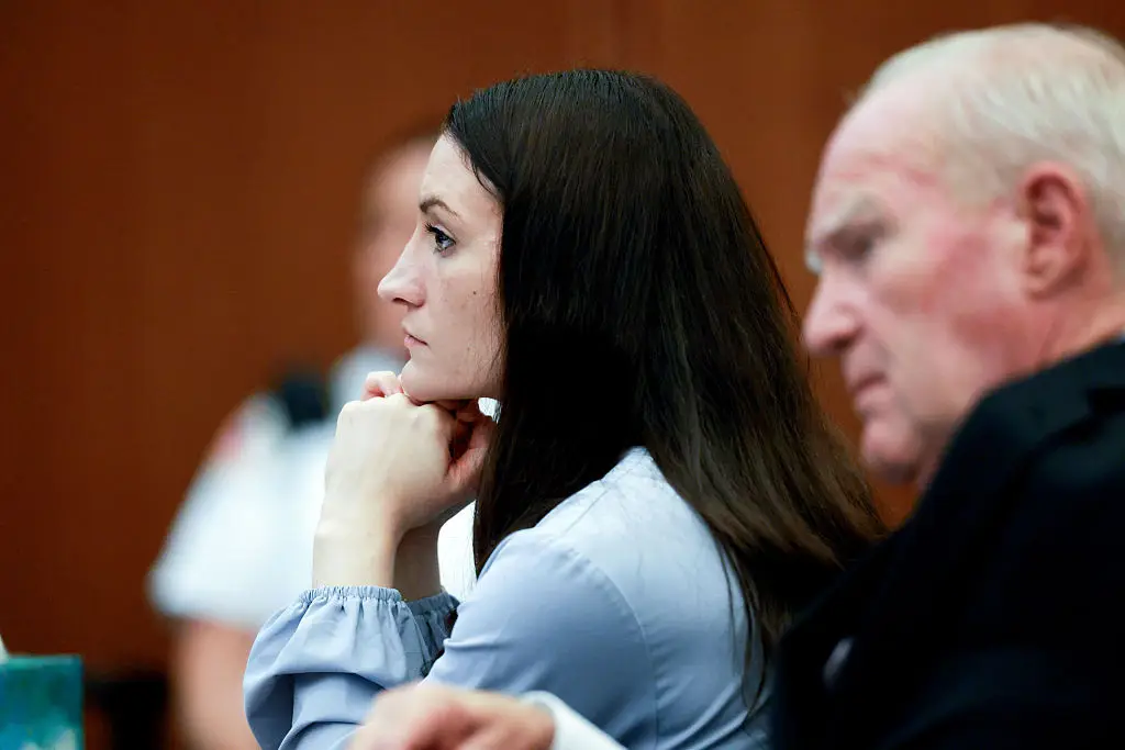Clancy beside her attorney (Jonathan Wiggs/The Boston Globe via Getty Images)