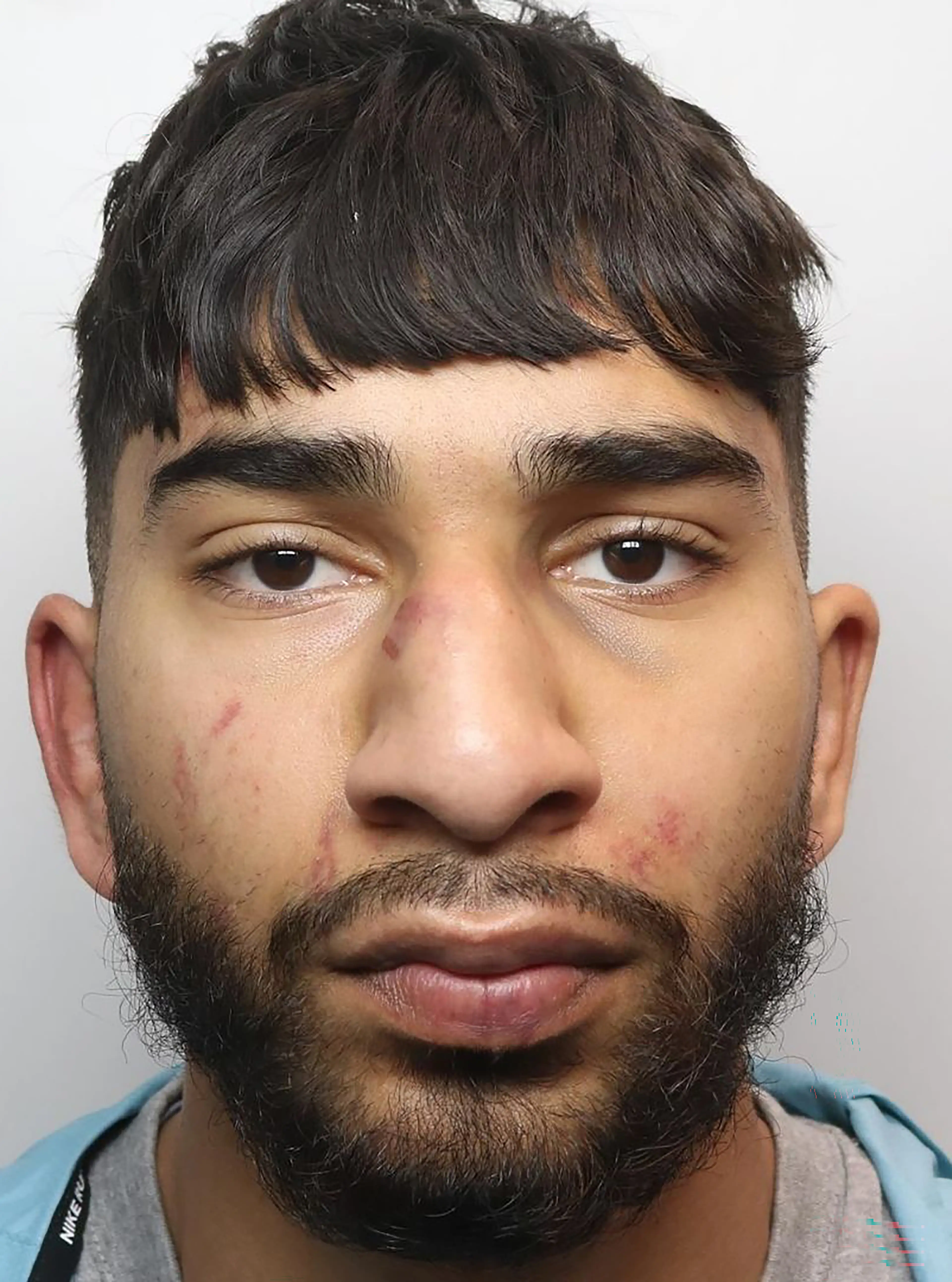 Mohammed Fahir Amaaz, 21, was found guilty of assaulting two female officers and a member of the public during the 2024 incident at Manchester Airport (Greater Manchester Police/PA Wire)