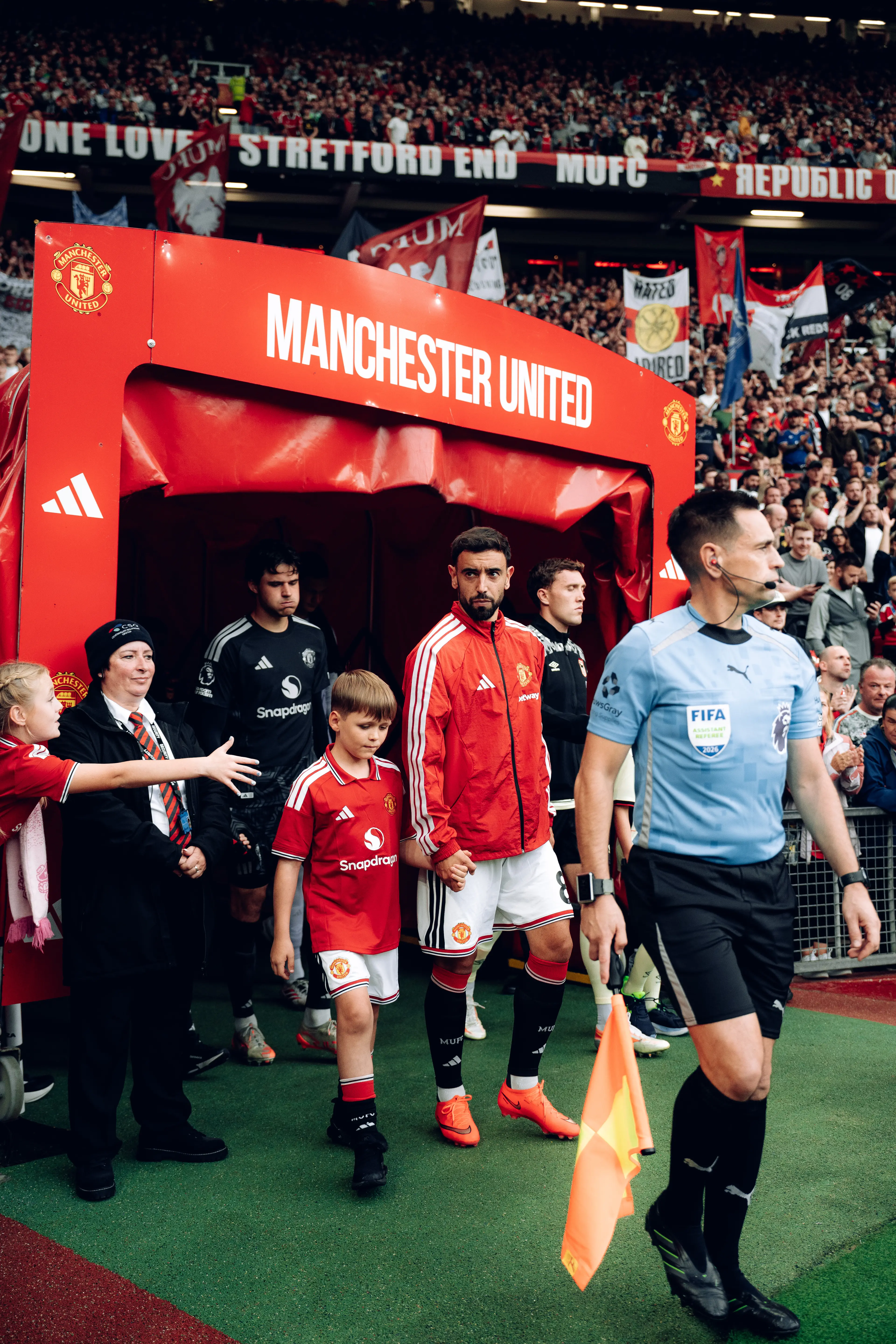 The two boys walked Manchester United out (Zohaib Alam/Manchester United via Getty Images)
