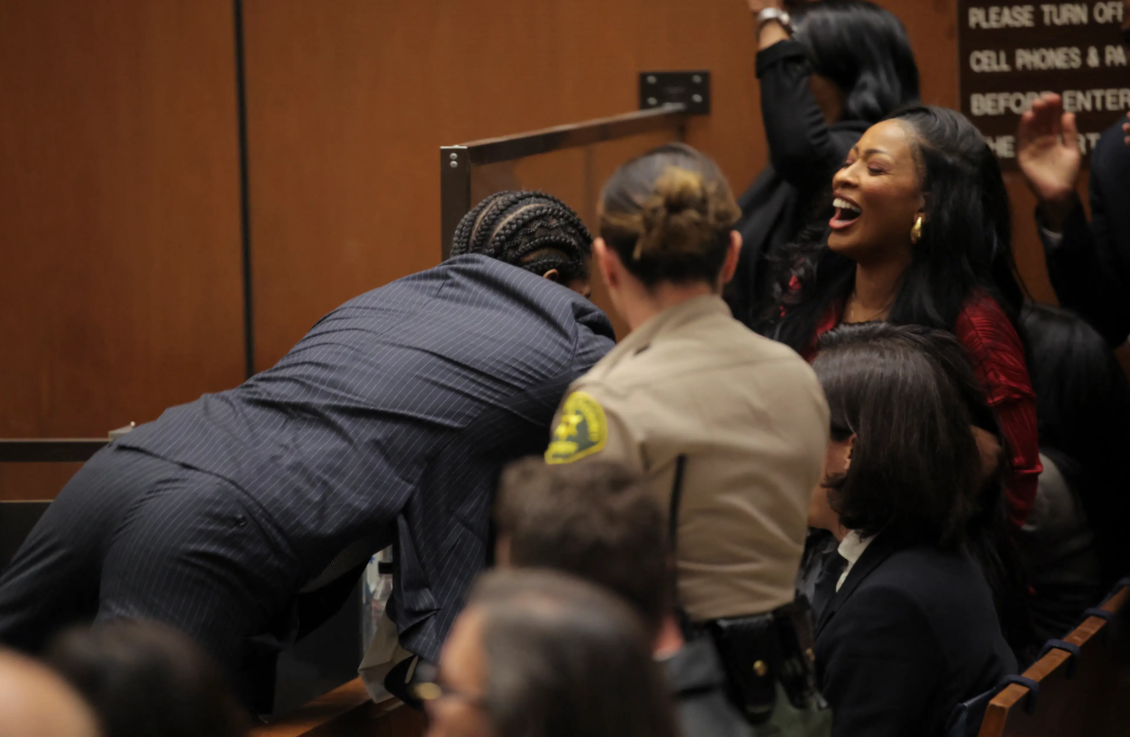After the verdict was read out he leaped towards his supporters in the gallery (DANIEL COLE/POOL/AFP via Getty Images)