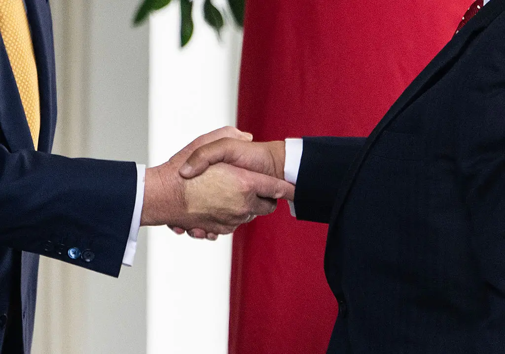 Trump's skin discolouration was previously put down to his handshakes (ANDREW CABALLERO-REYNOLDS/AFP via Getty Images)