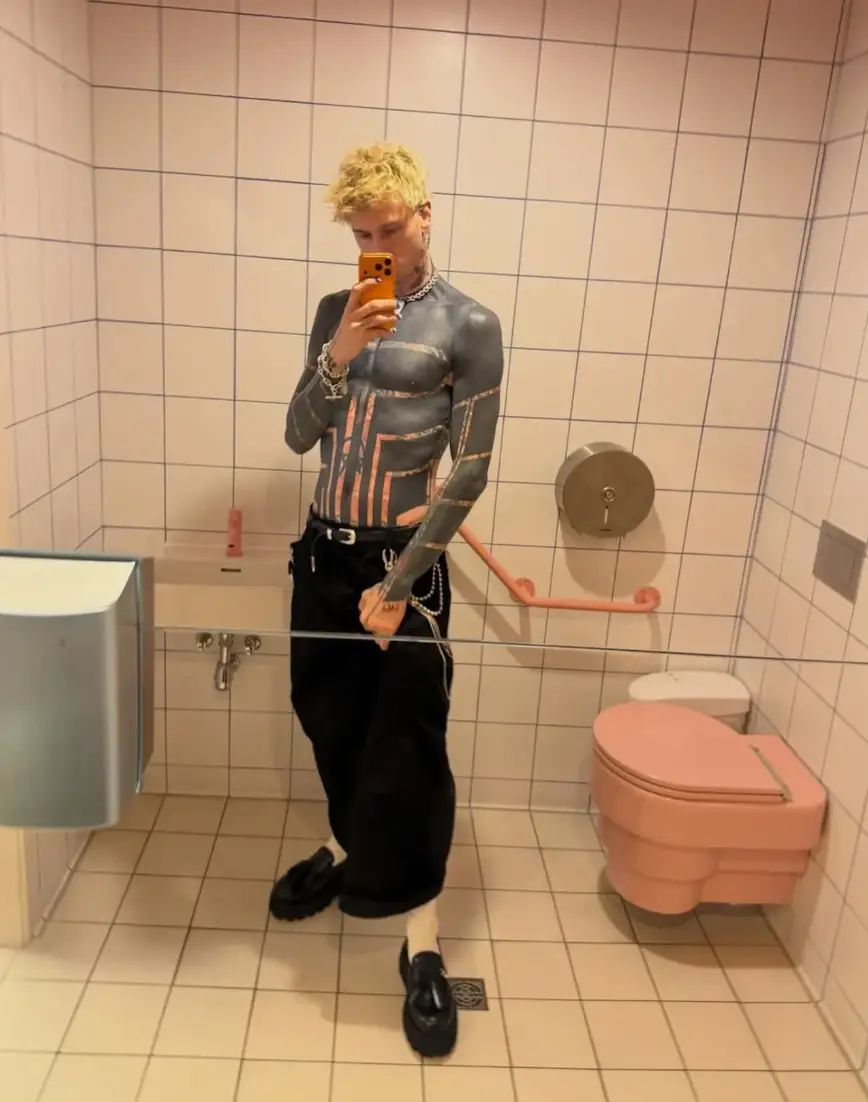 Machine Gun Kelly didn’t want to wait for his ‘dark mode’ tattoos (Instagram/@machinegunkelly)