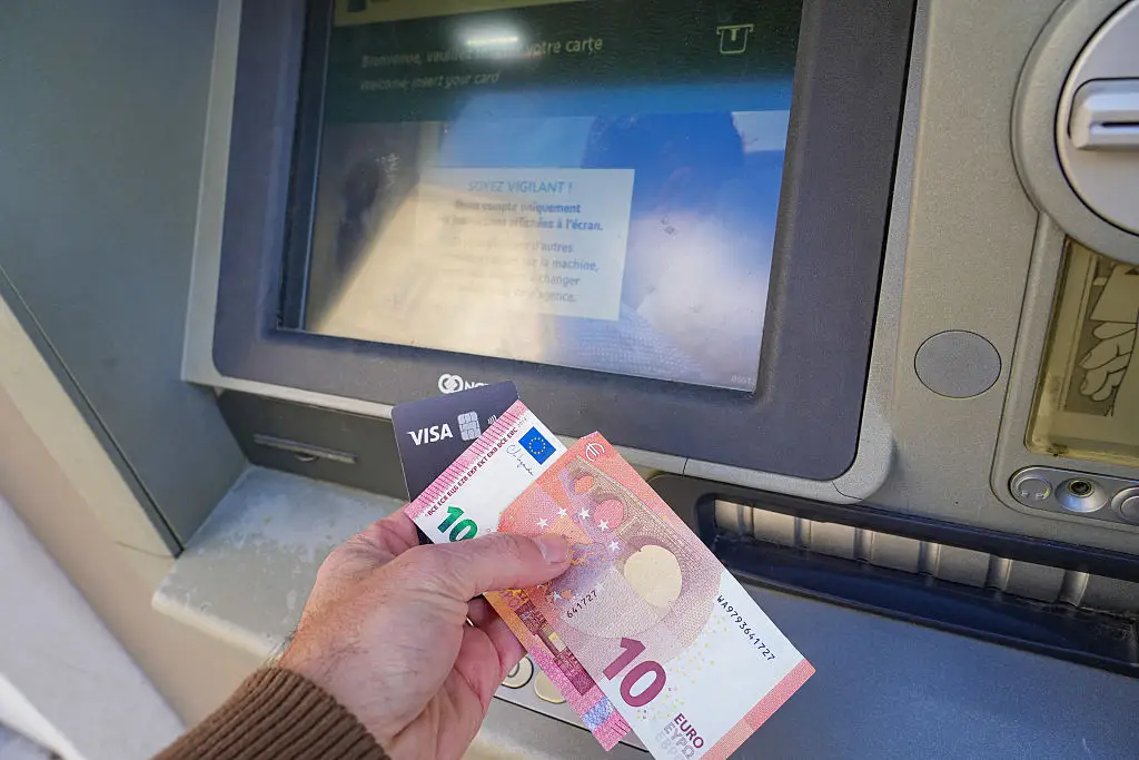 Taking cash out abroad while you've got a card that could do the job better is not a good idea (Nicolas Guyonnet / Hans Lucas / AFP via Getty Images)