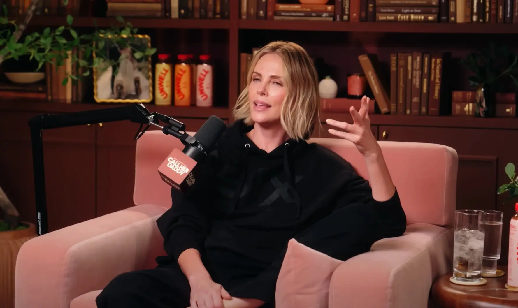 Charlize says it's not to protect the director, but to prevent him becoming the story (YouTube/Call Her Daddy)