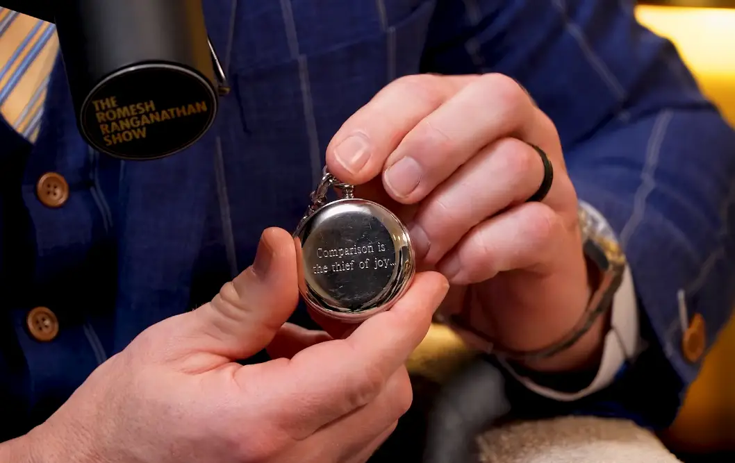 Cena revealed the pocket watch was engraved with the phrase 'comparison is the theif of joy' (YouTube/@The Romesh Ranganathan Show)