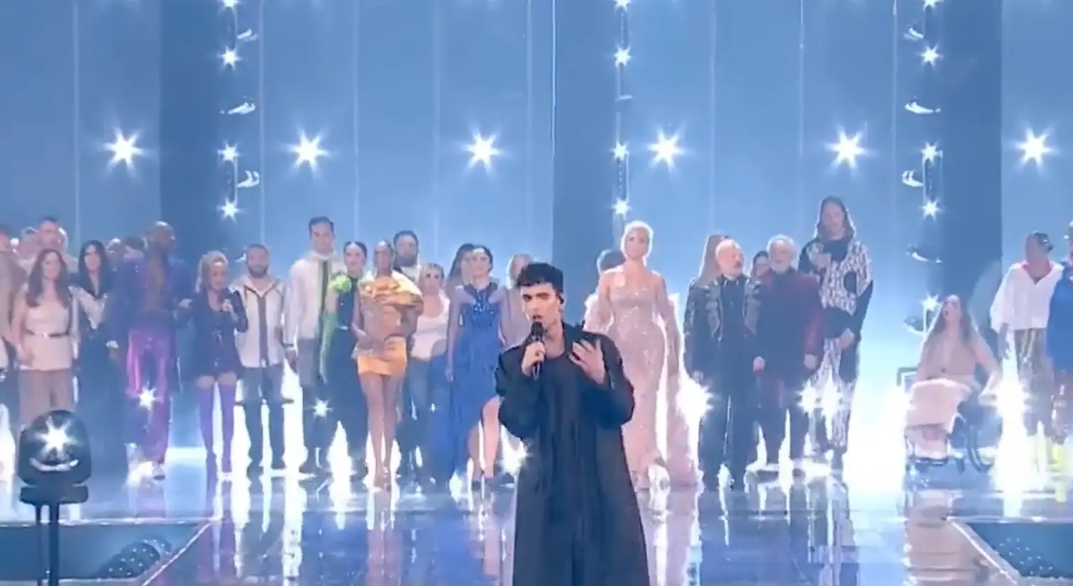 The hosts and stars joined Lawrence on stage for the song.