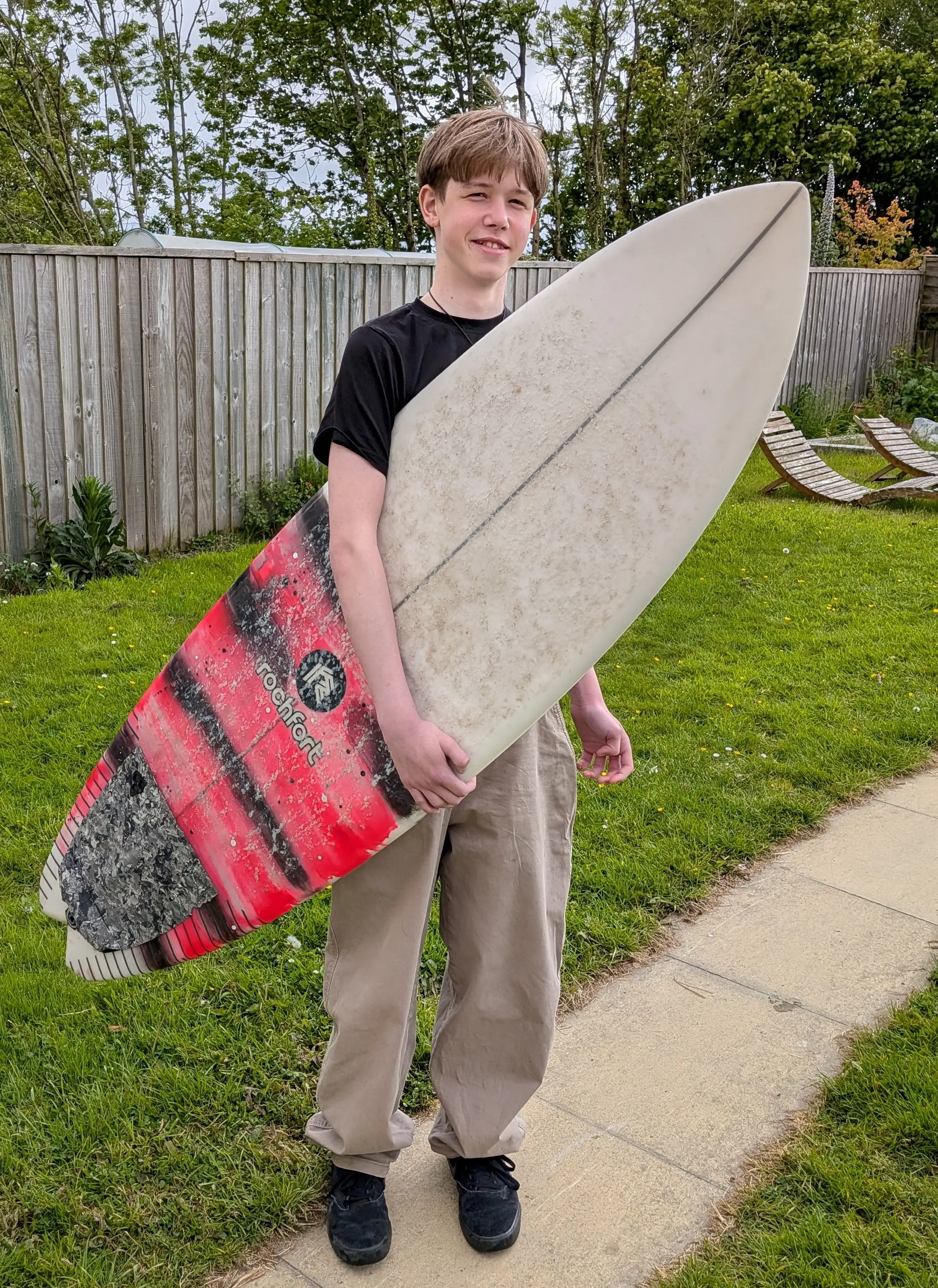 Ruben is active in sports, including surfing (SWNS)