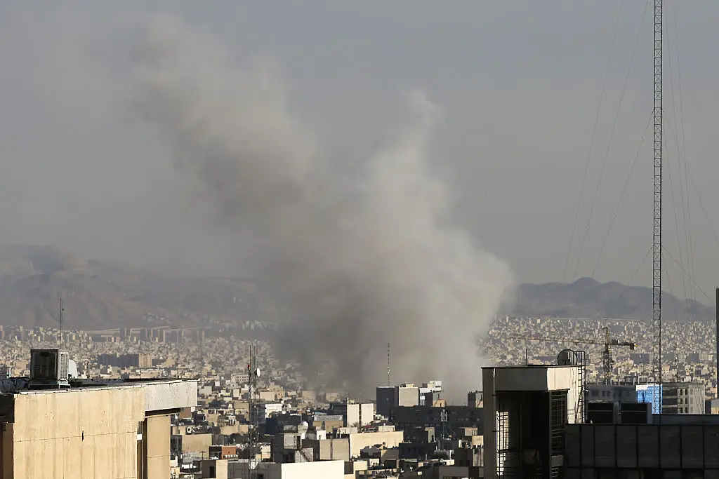 Smoke rising over Tehran on 2 March following strikes from the US and Israel (Fatemeh Bahrami/Anadolu via Getty Images)