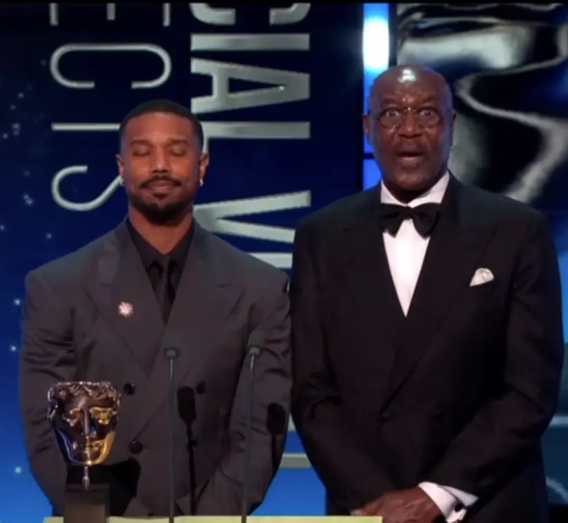 Michael B Jordan and Delroy Lindo looked visibly uncomfortable onstage as they heard the word (BBC)