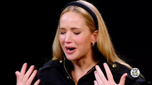 Tears streamed down Lawrence's face as she climbed the Scoville heat scale.