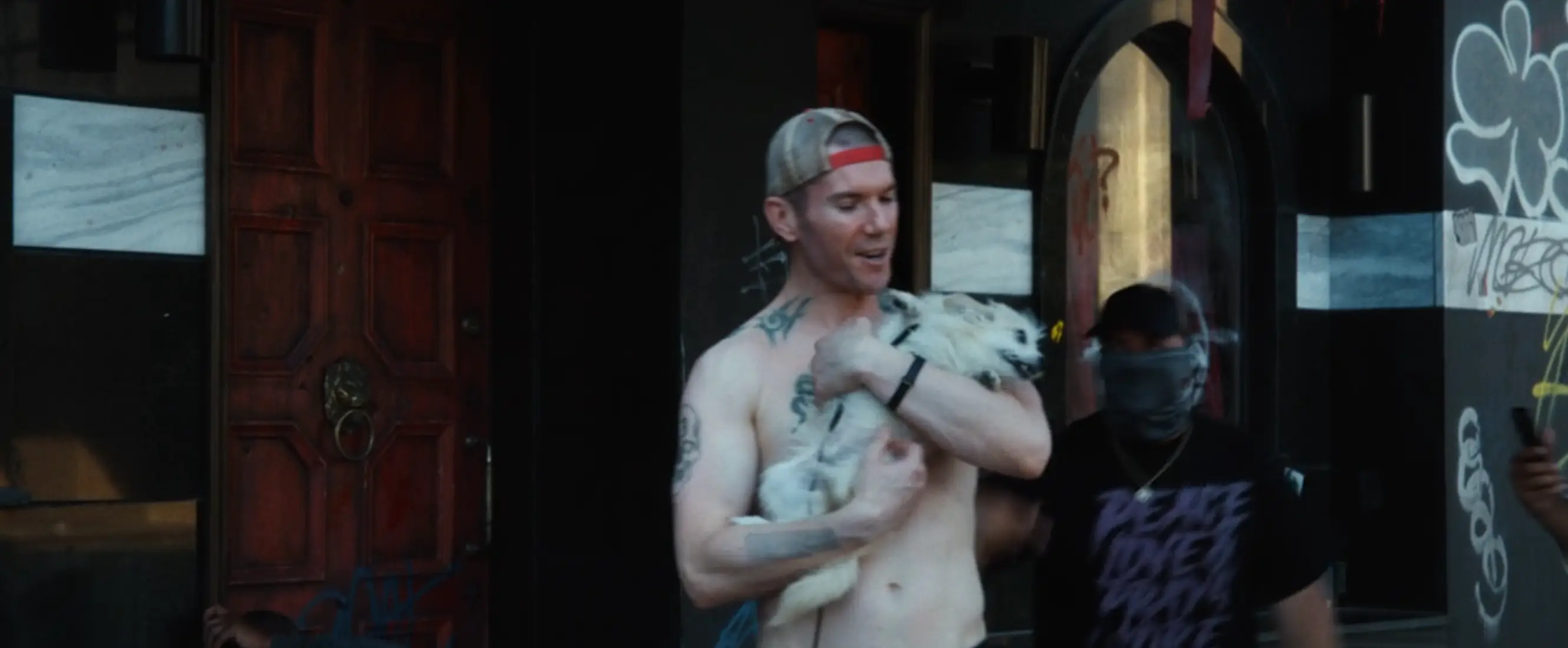 The dog is taken off a homeless veteran and thrown in front of a truck (Disney+)