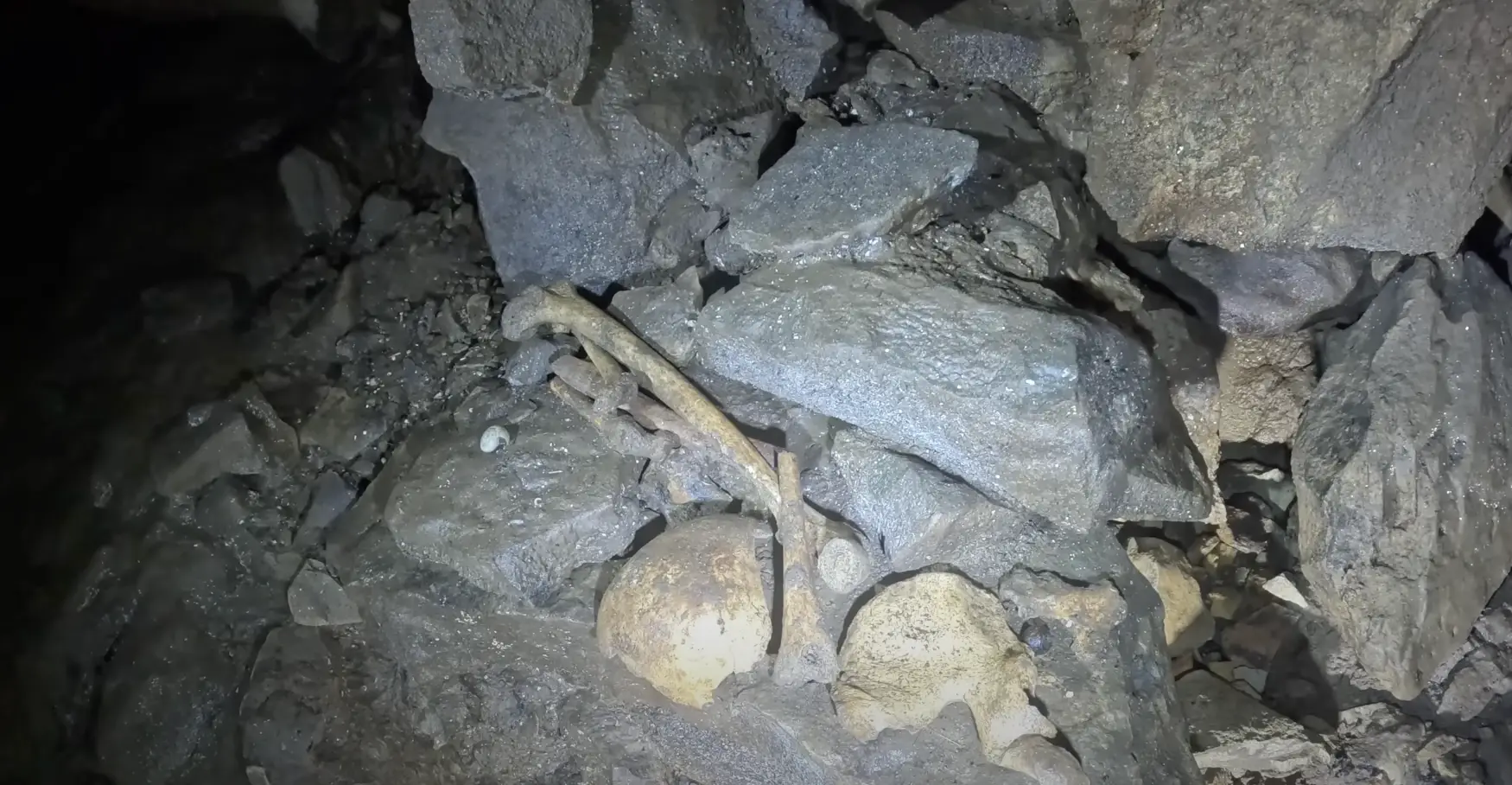 The content creators found bones in the cave (YouTube/ActionAdventureTwins)