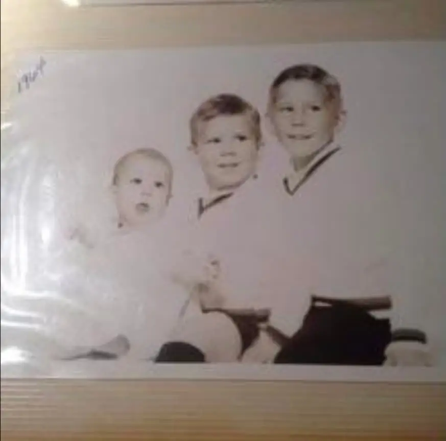 He shared a picture with his real brothers.