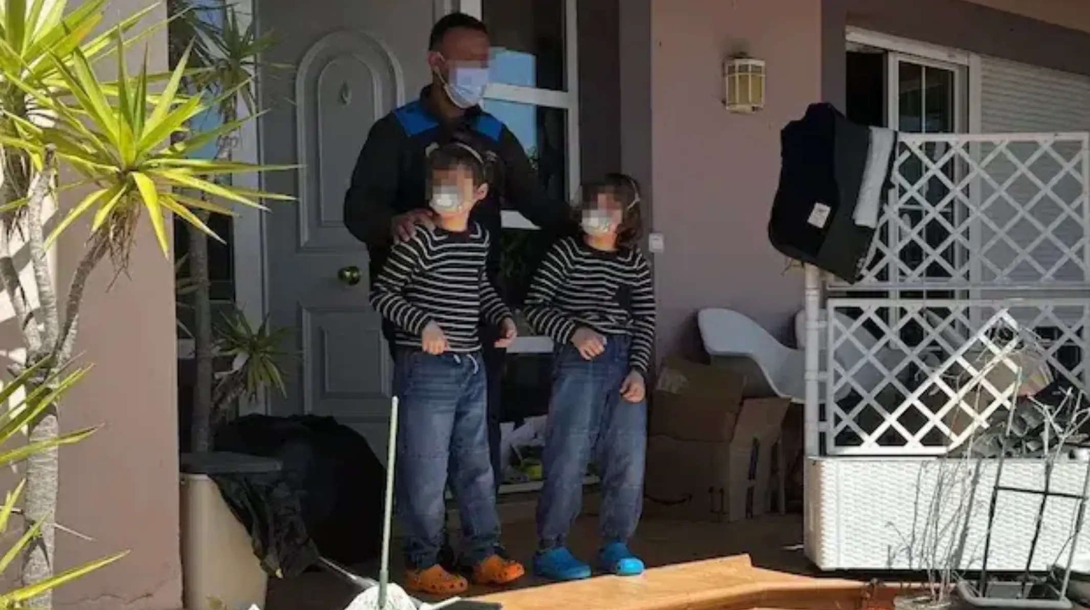 The mother reportedly asked police to wear a mask when entering the hosue (Police Handout)
