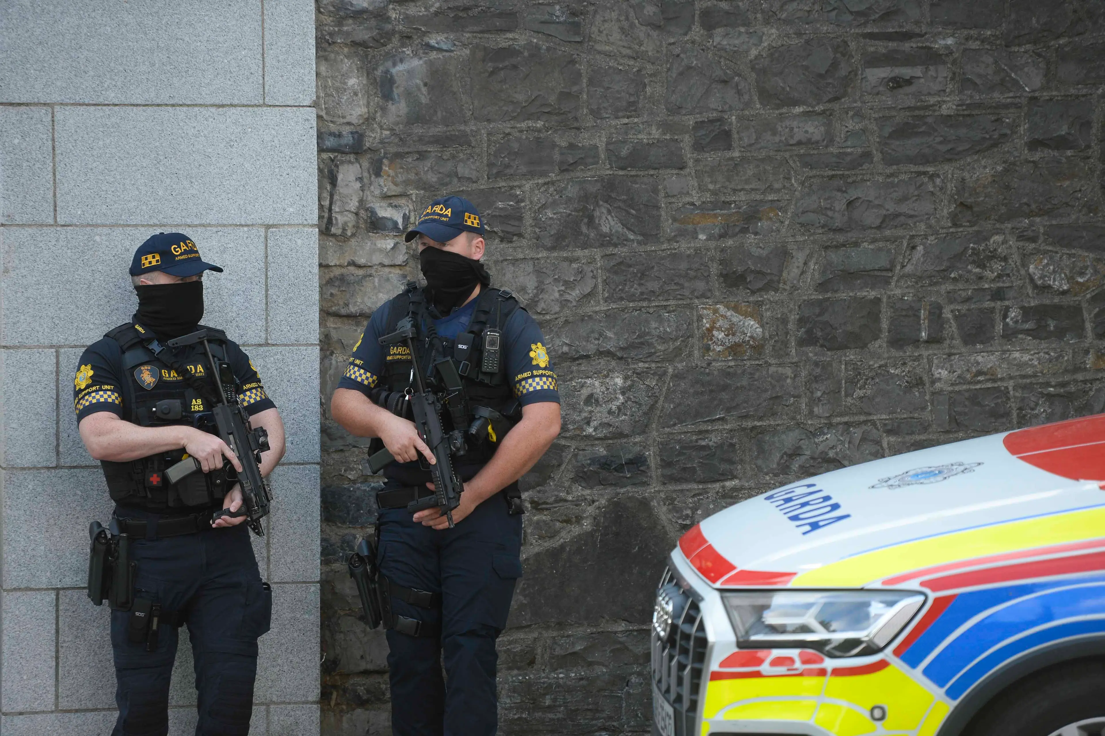Armed officers at the Criminal Courts of Justice (Mark Marlow / PA Wire)