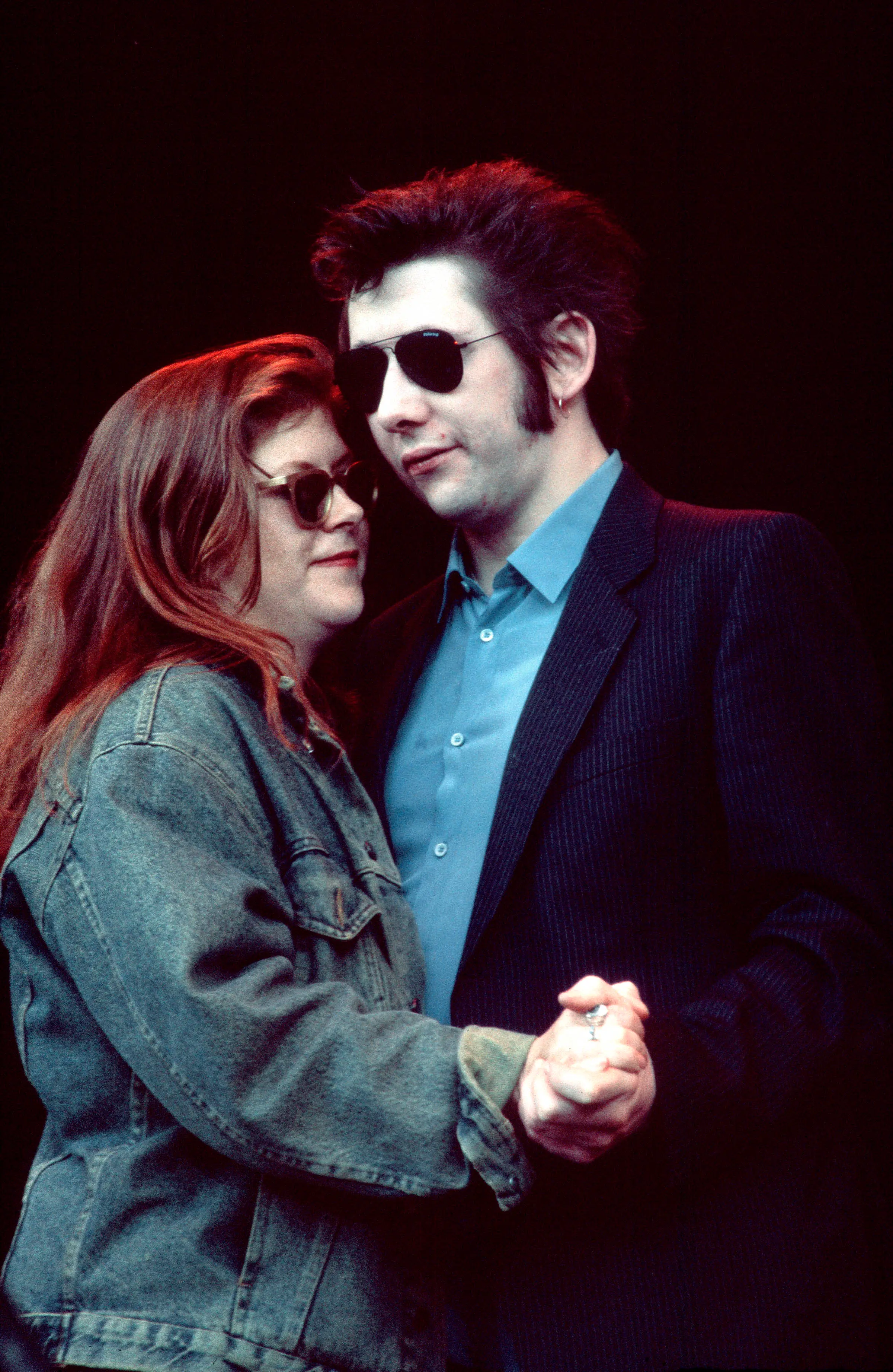 The late star pictured with fellow 'Fairytale of New York' singer Shane MacGowan in 1994 (Patrick Ford/Redferns)