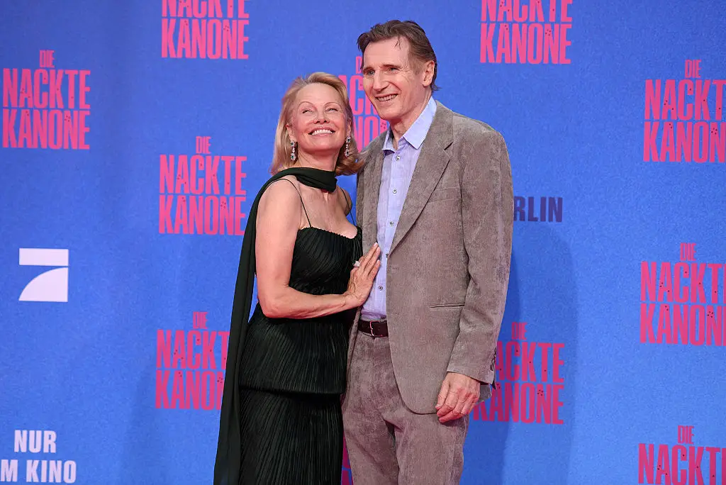 Liam Neeson and Pamela Anderson are making us all believe in love again (Tristar Media/WireImage)