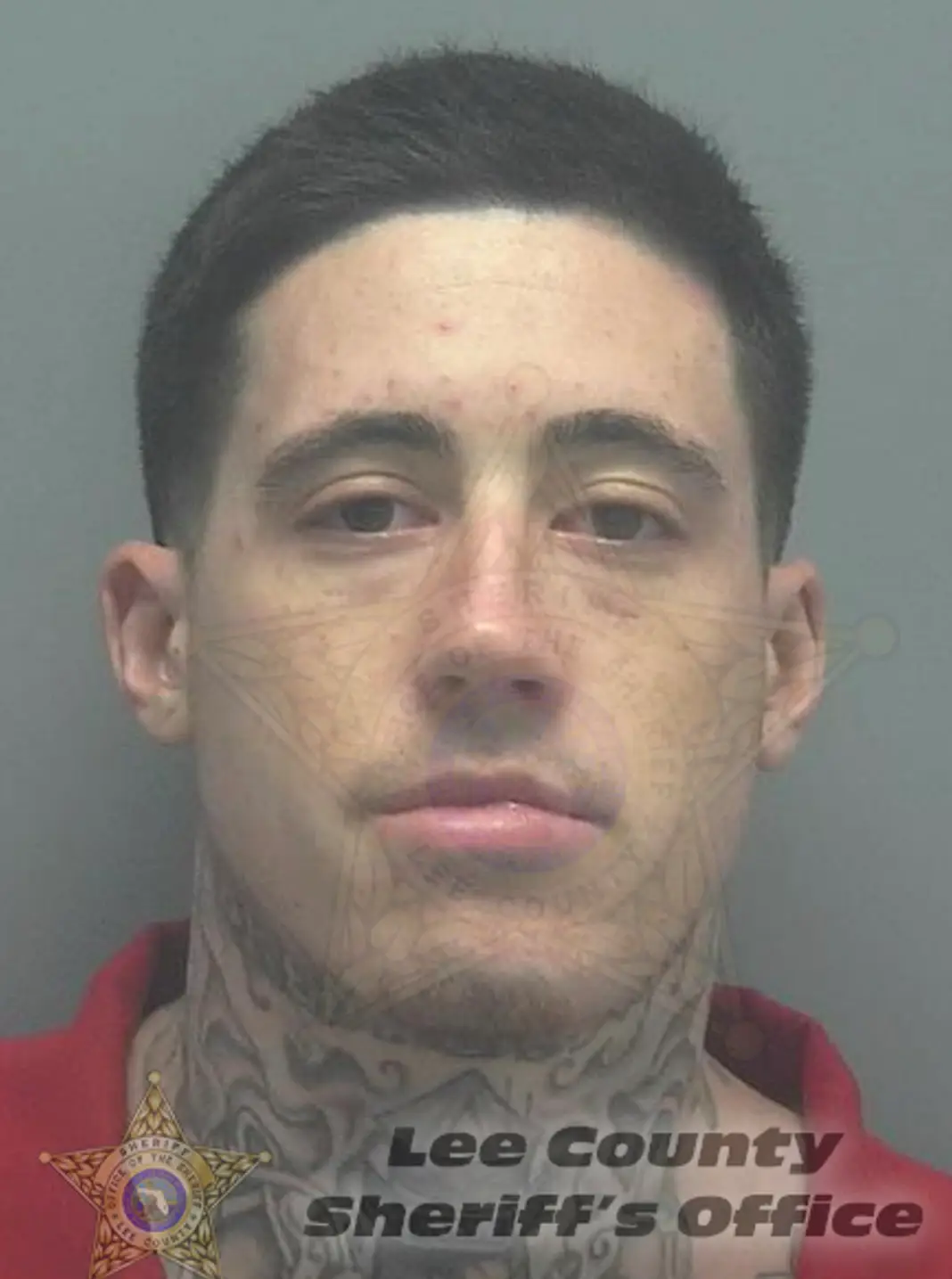 Wilson seen in his 2019 mugshot following his arrest for the murders, with no face tatttoos (Lee County Sheriff’s Office)
