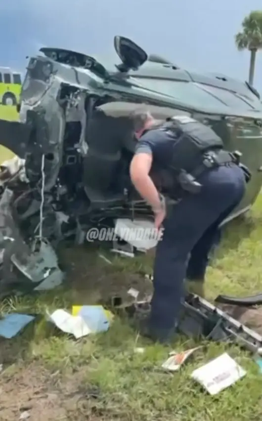 A survivor was found in the mangled wreckage of an overturned vehicle (X/@ONLYinDADE)