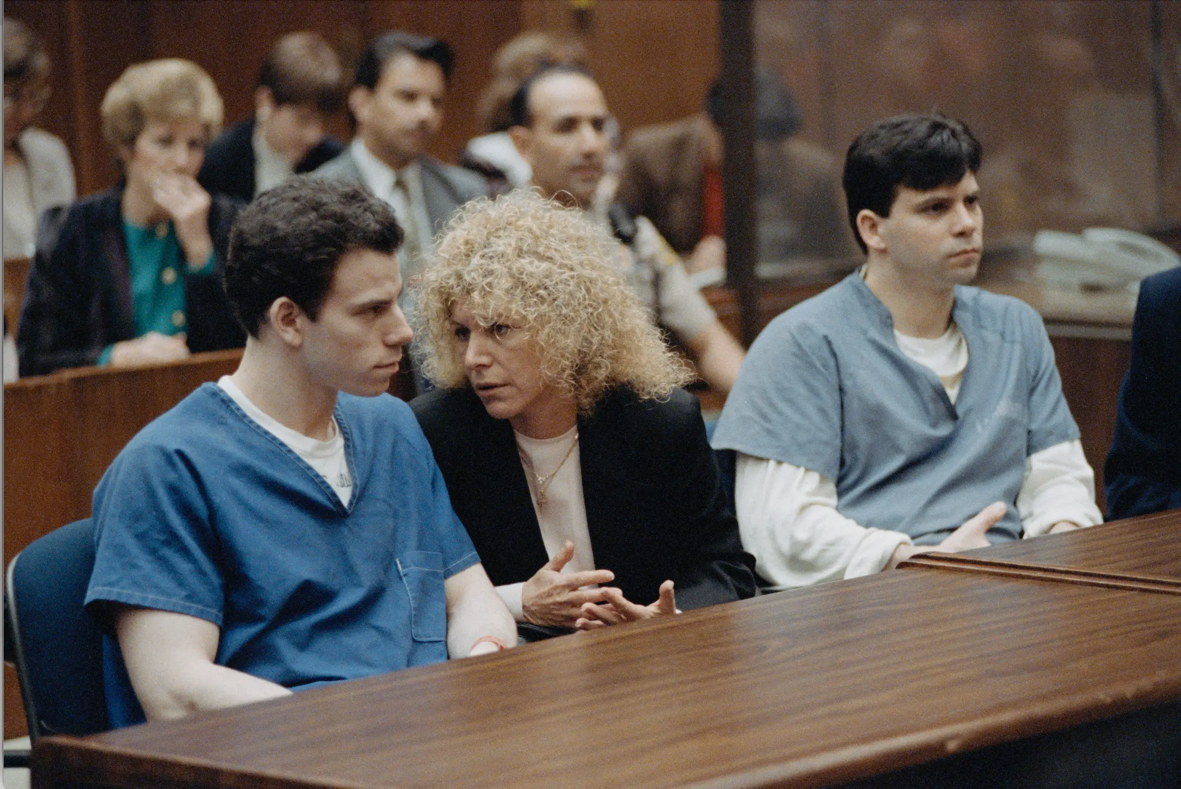 The Menendez brothers and their lawyer (VINCE BUCCI/AFP via Getty Images)