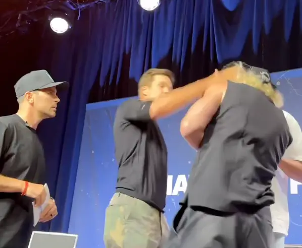 Brady slaps Paul (X/Fanatics)