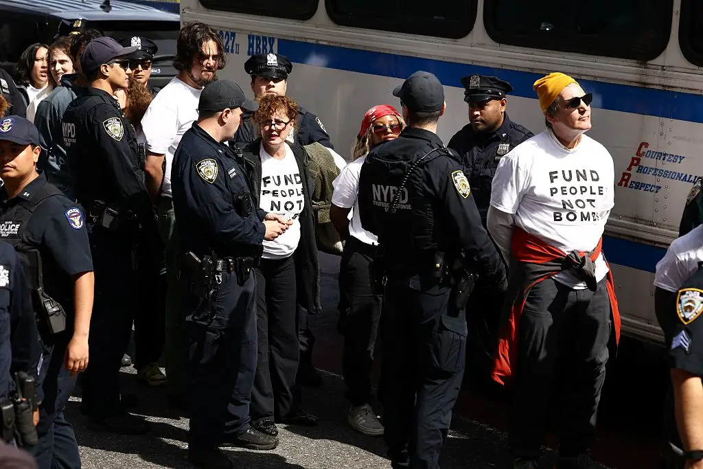 Protesters were detained at the scene ( CHARLY TRIBALLEAU / AFP via Getty Images)