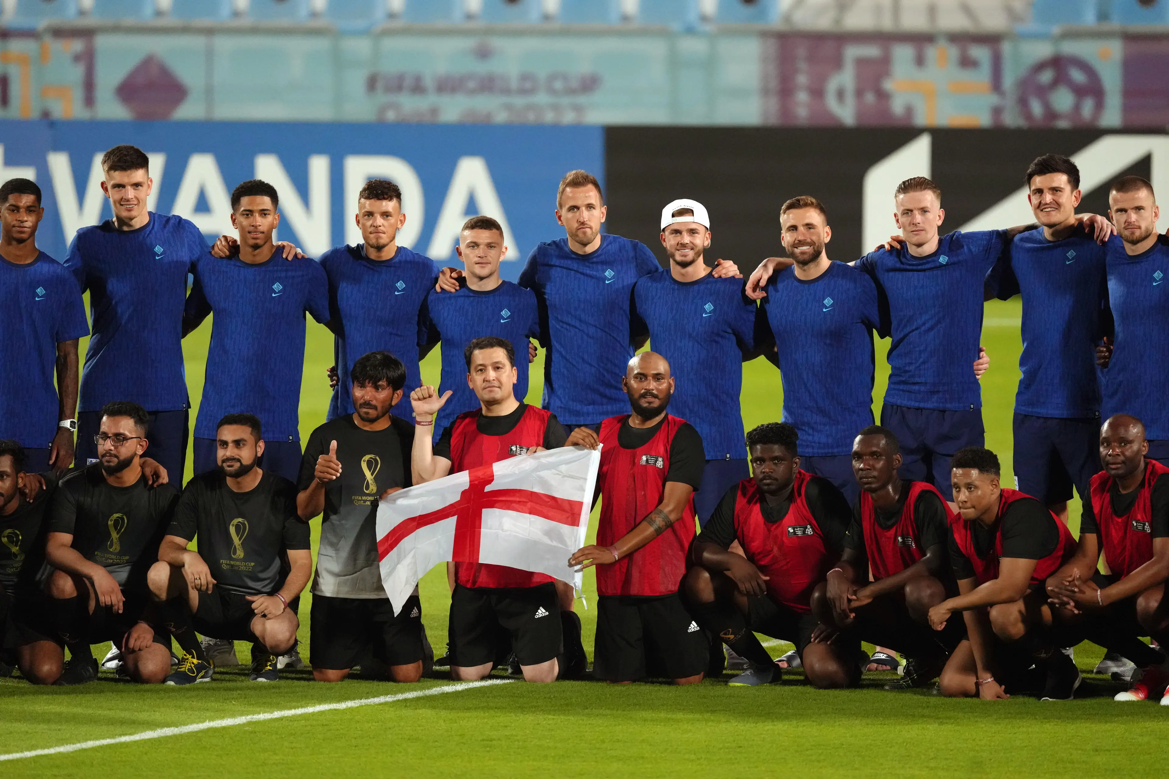 The team met migrant workers in Qatar.