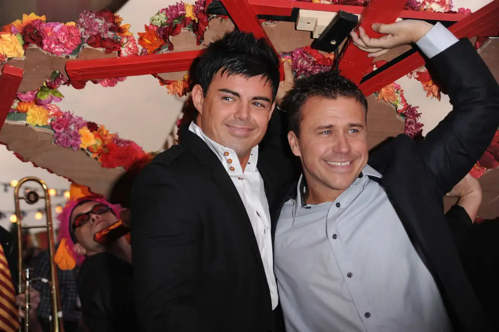 Phillips with Anthony Hutton, who won Big Brother 6 (Ian Gavan/Getty Images)
