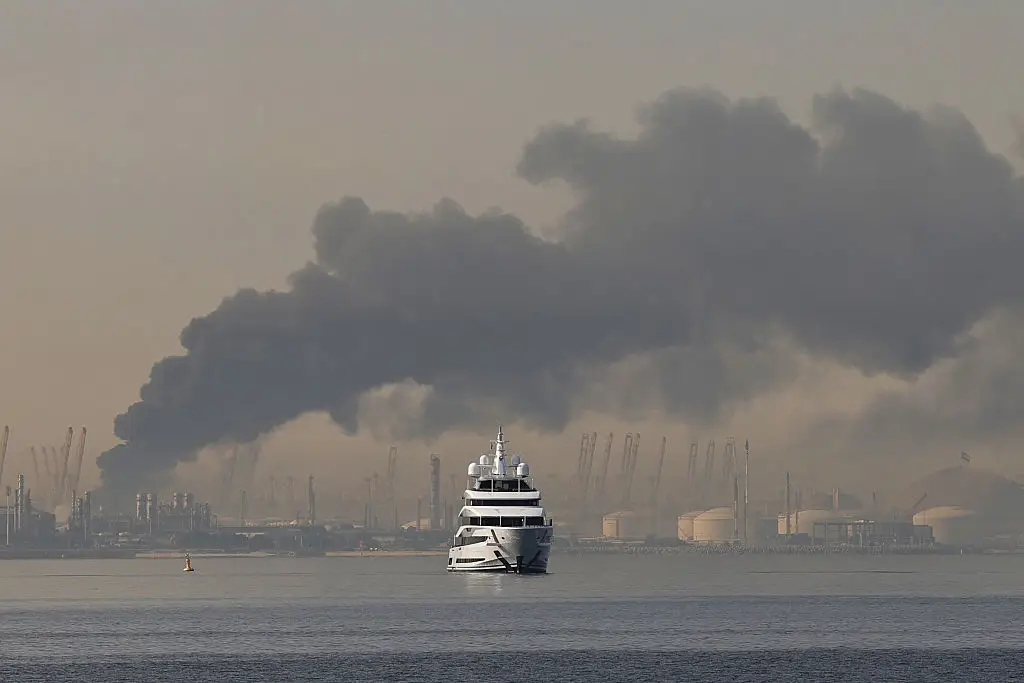 A plume of smoke rises from the port of Jebel Ali on the southern outskirts of Dubai following a suspected Iranian missile strike on 1 March (Fadel SENNA / AFP via Getty Images)