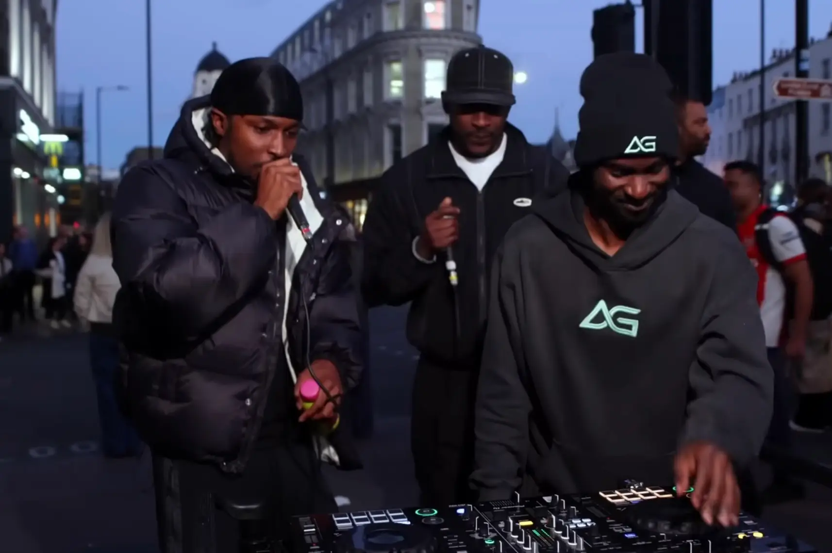 DJ AG seen with London rap stars JME and Skepta (YouTube/DJ AG Online)