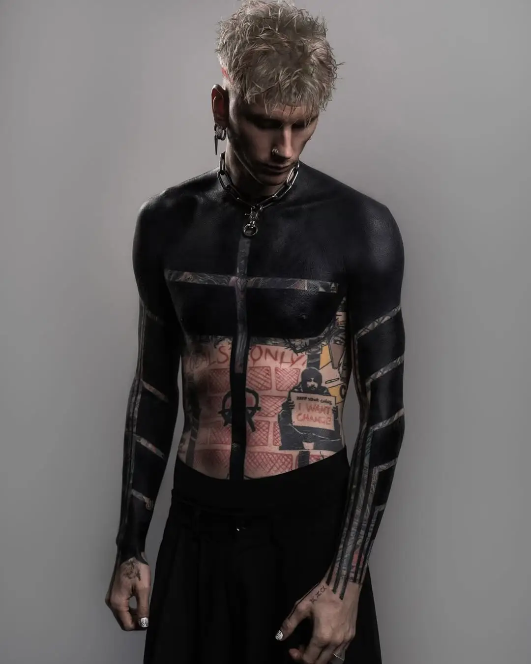 Machine Gun Kelly didn’t want to wait for his ‘dark mode’ tattoos (Instagram/@machinegunkelly)
