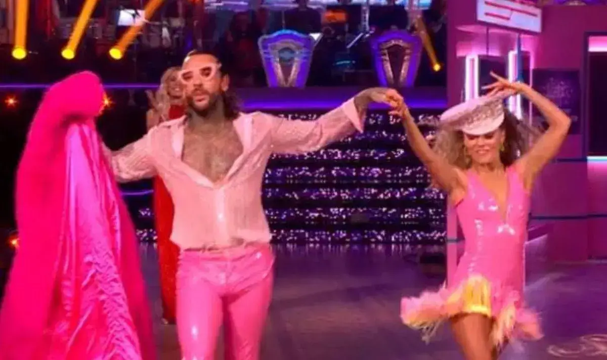 Anyone who can dance capably in those trousers deserves some respect. (BBC)