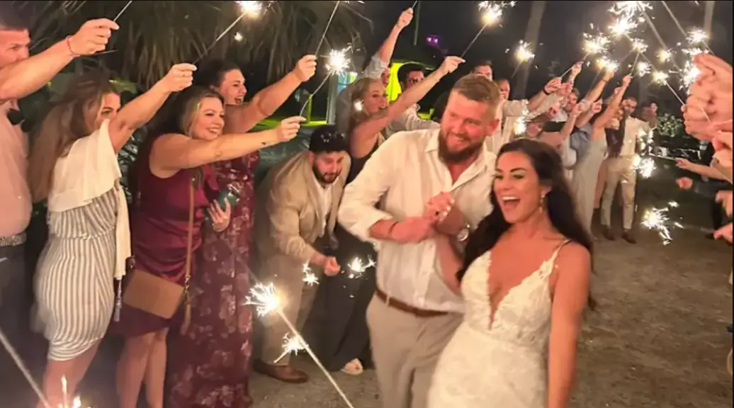 Samantha and Aric Hutchinson on their wedding day (GoFundMe)