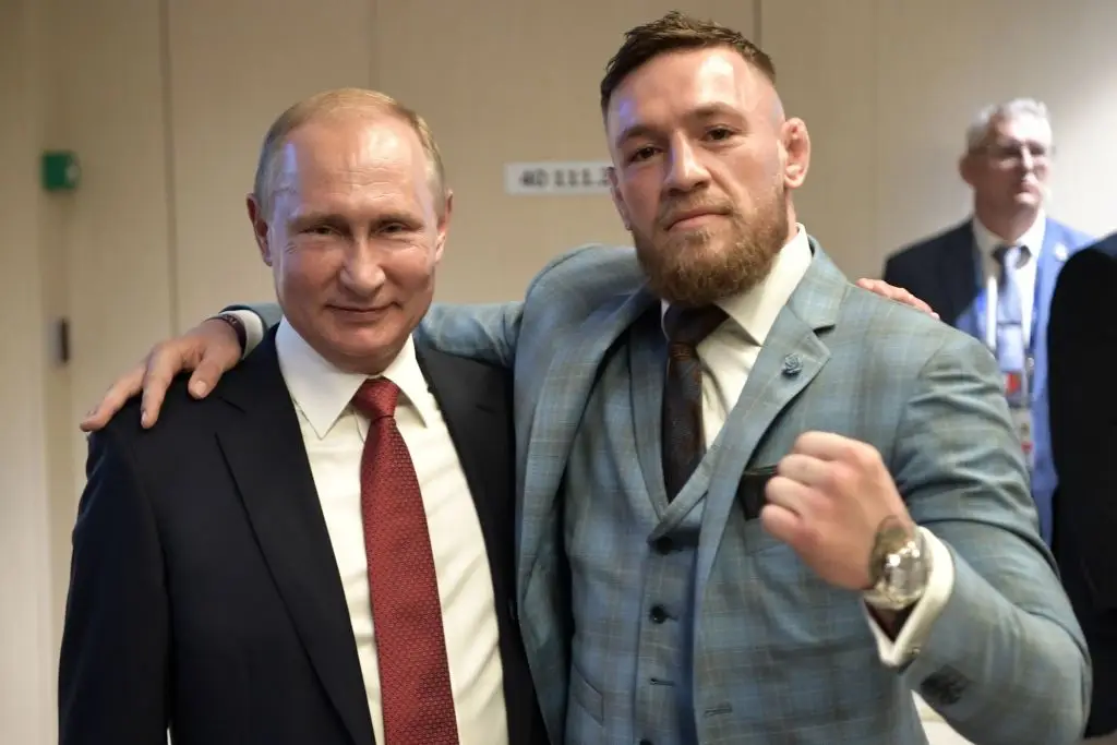 The fighter was told not to put his arm around Putin (ALEXEY NIKOLSKY/AFP via Getty Images)