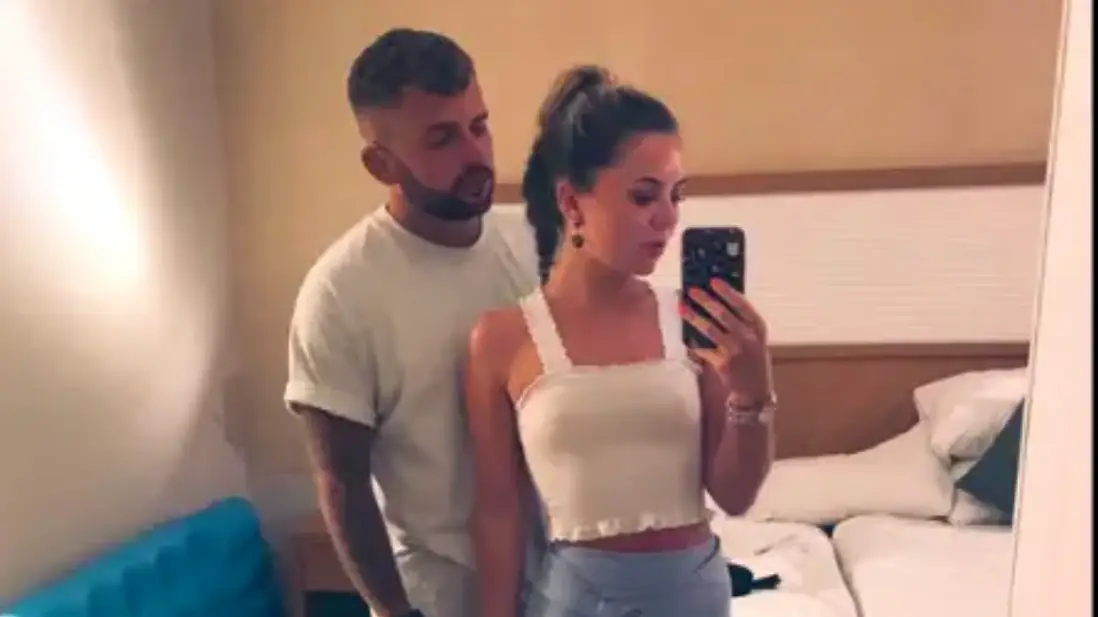 Woman 'mortified' after X-rated detail in holiday photo spotted by dad