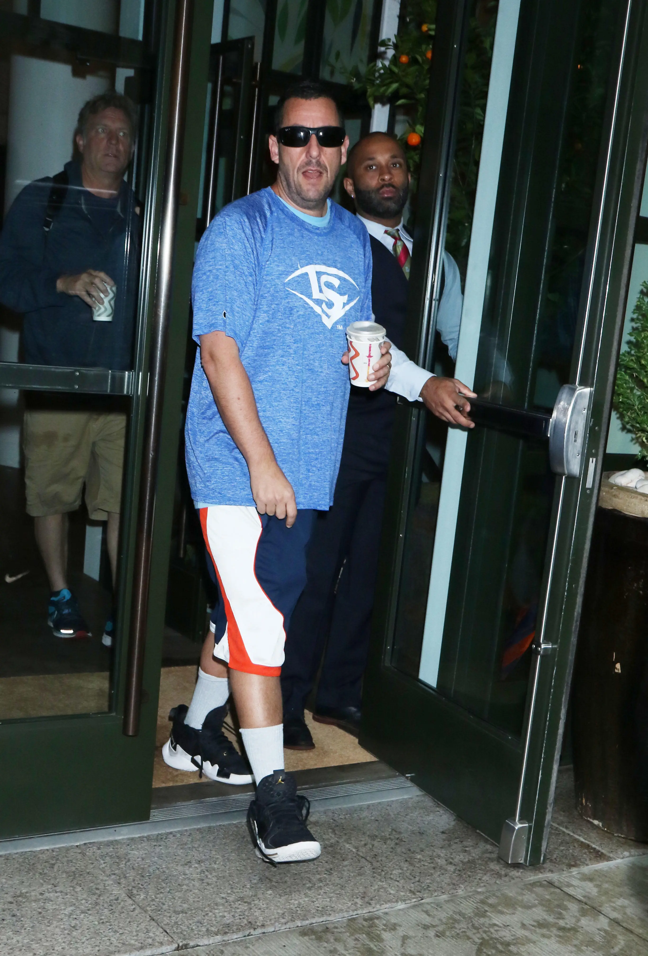 Vogue has called Adam Sandler the 'style icon of 2021'.