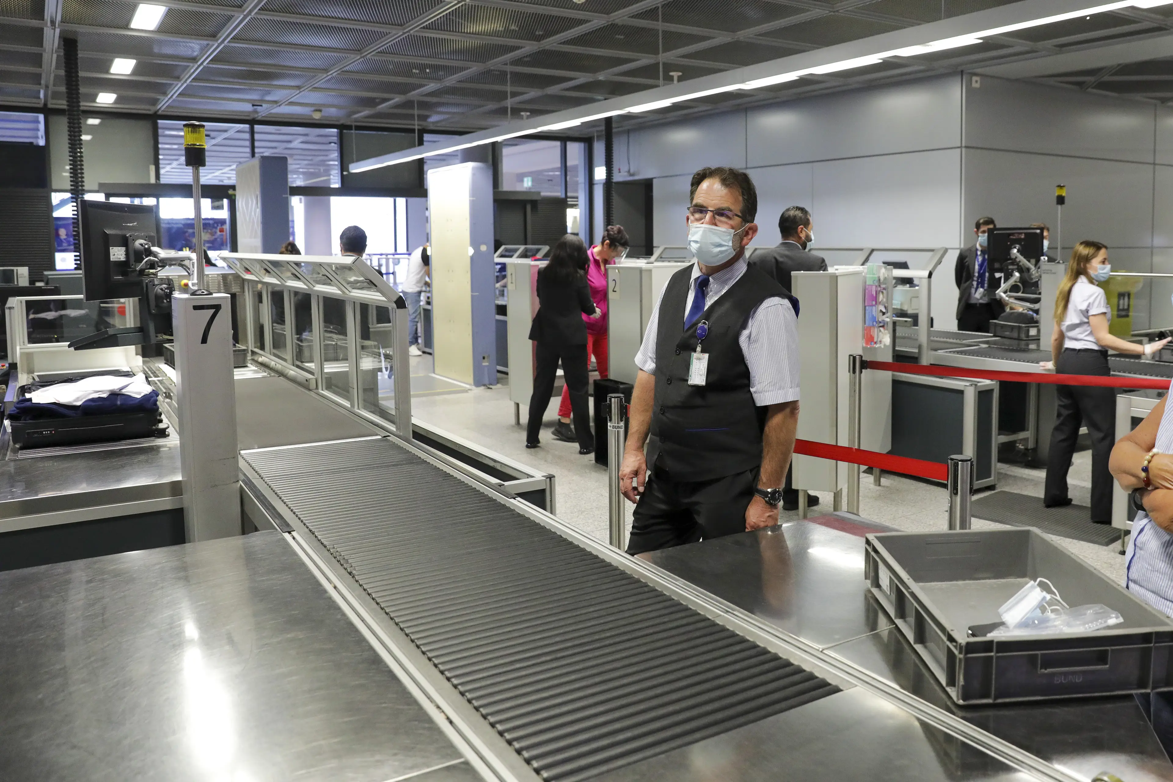 Our belongings head off on a brief journey off their own through the scanners when we reach airport security (Alex Kraus/Bloomberg via Getty Images)