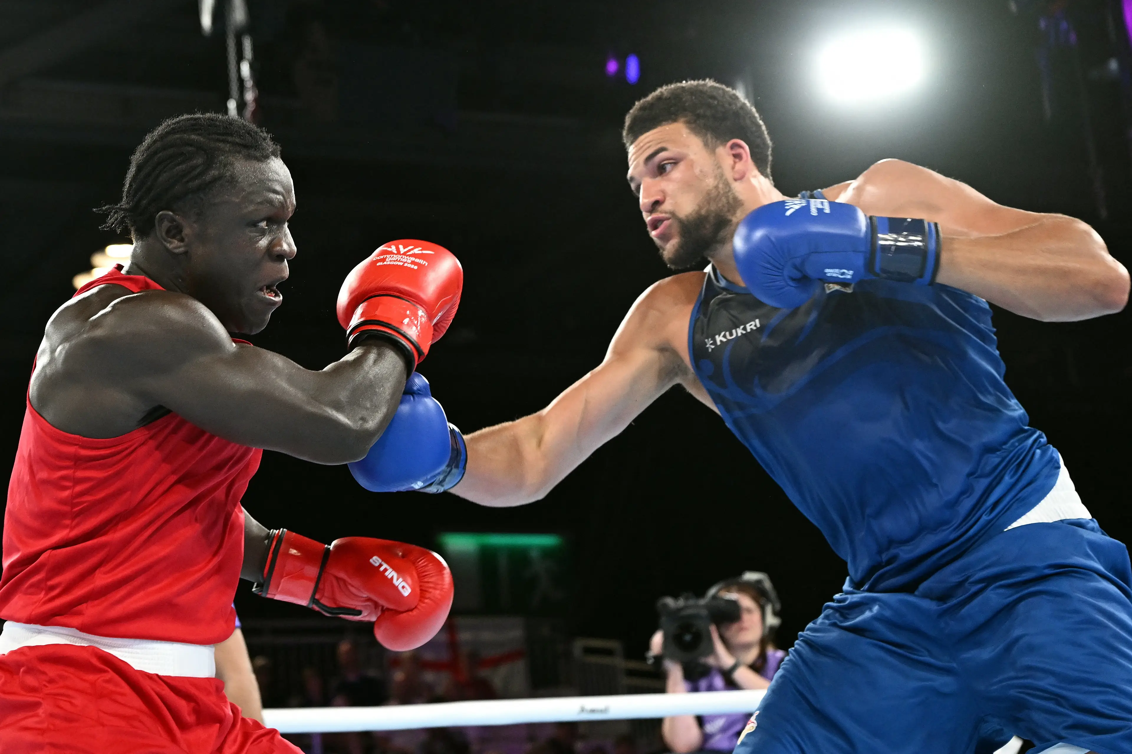 Uganda's Aziz Abdul was disqualified for head-butting Damar Thomas in the ring (ANDY BUCHANAN/AFP via Getty Images)
