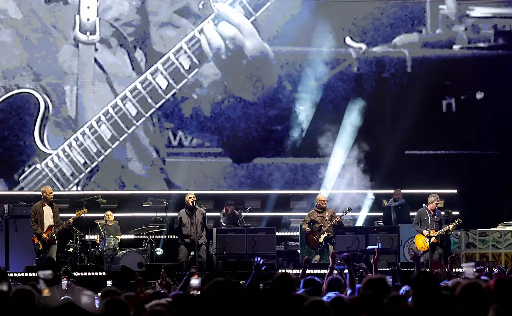 Oasis are rumoured to be returning for a 12-night Manchester residency (Kevin Winter/Getty Images)
