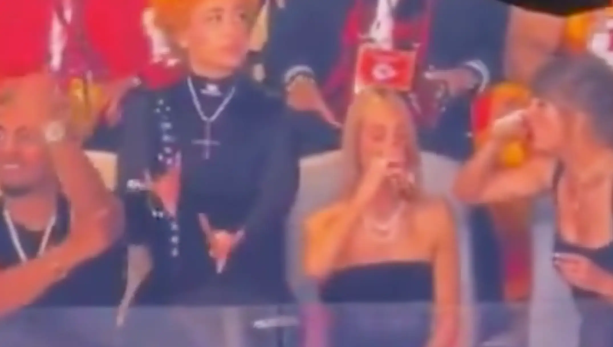 Ice Spice was seen gesturing with her hands during the Super Bowl.