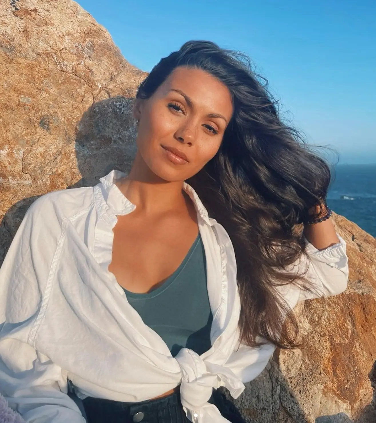 The actress said her first kiss being onscreen was a 'weird' experience.