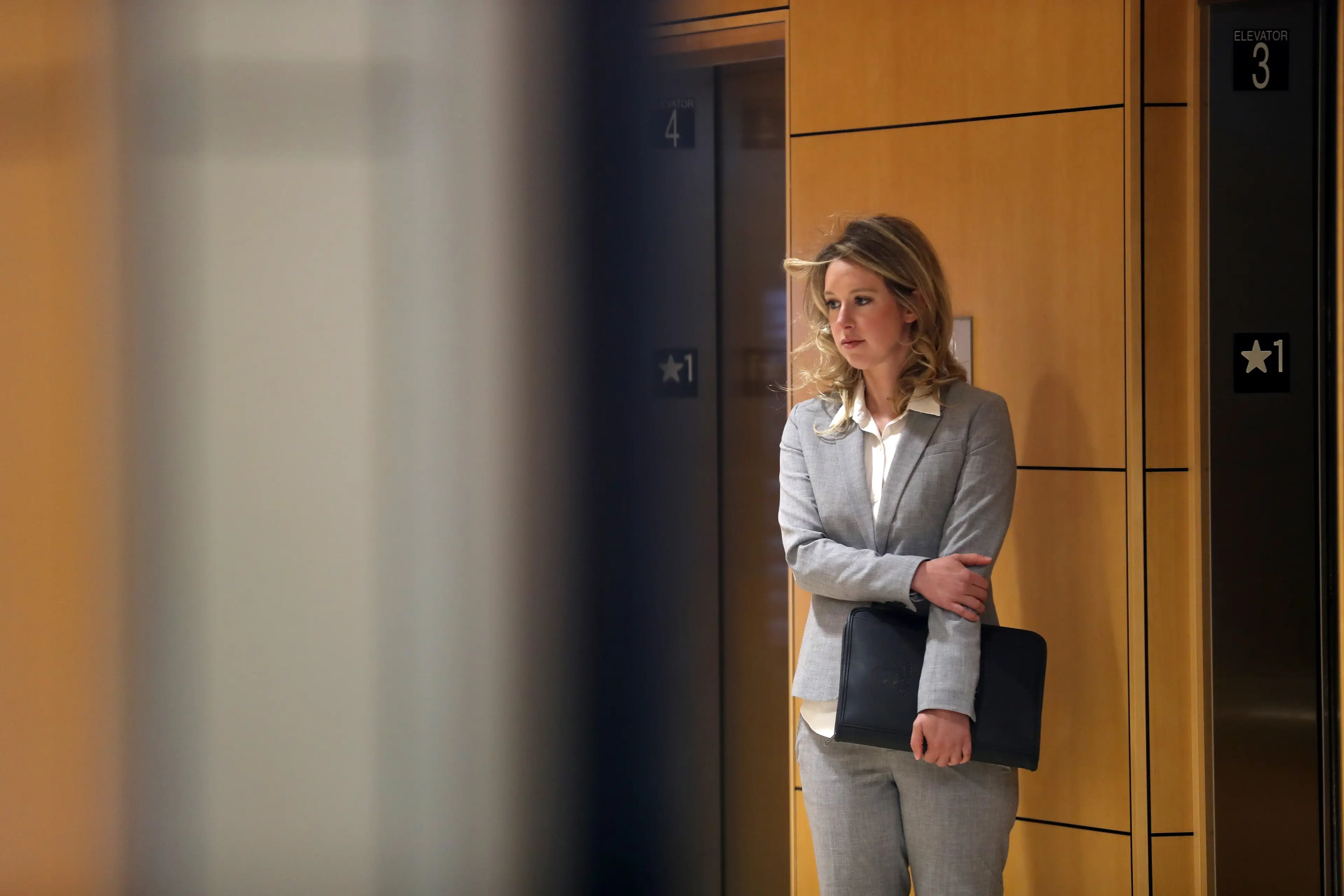 Elizabeth Holmes has since had her sentenced reduced by two years and is predicted to release in 2032 with good behaviour (Justin Sullivan/Getty Images)