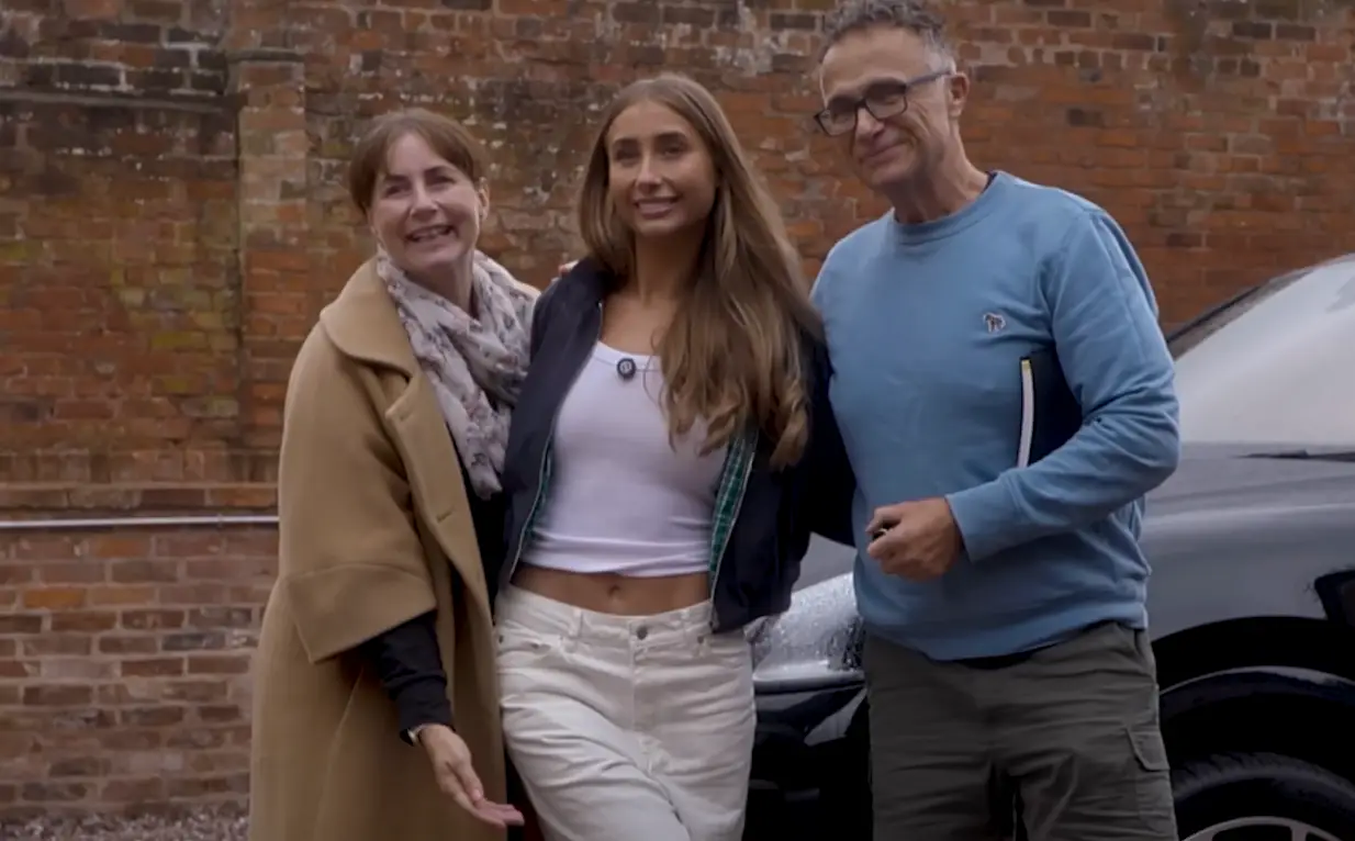 Her dad was 'chuffed to bits' while looking at his new car (YouTube/Lily Phillips)