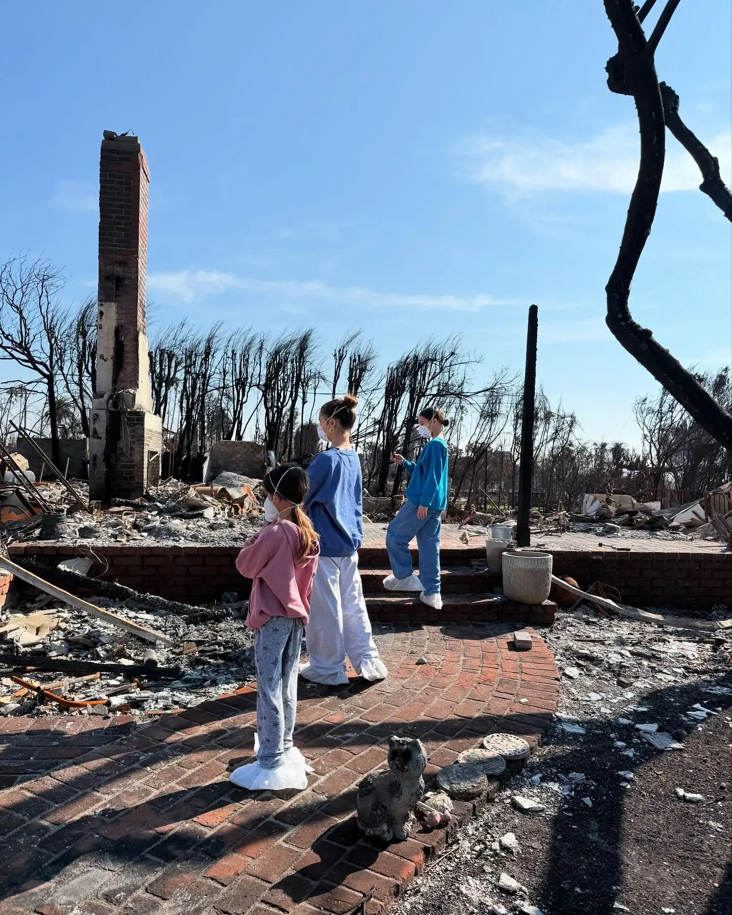 The family returned to their ruined home after the Palisades fires (Instagram/@ichadlowe)