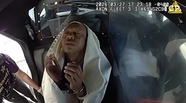 Police bodycam footage shows Tiger Woods speaking on the phone before his arrest (Martin County Sheriff’s Office)